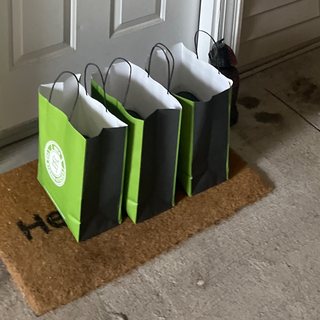 Three Strong Kitchen bags waiting at a customer’s door